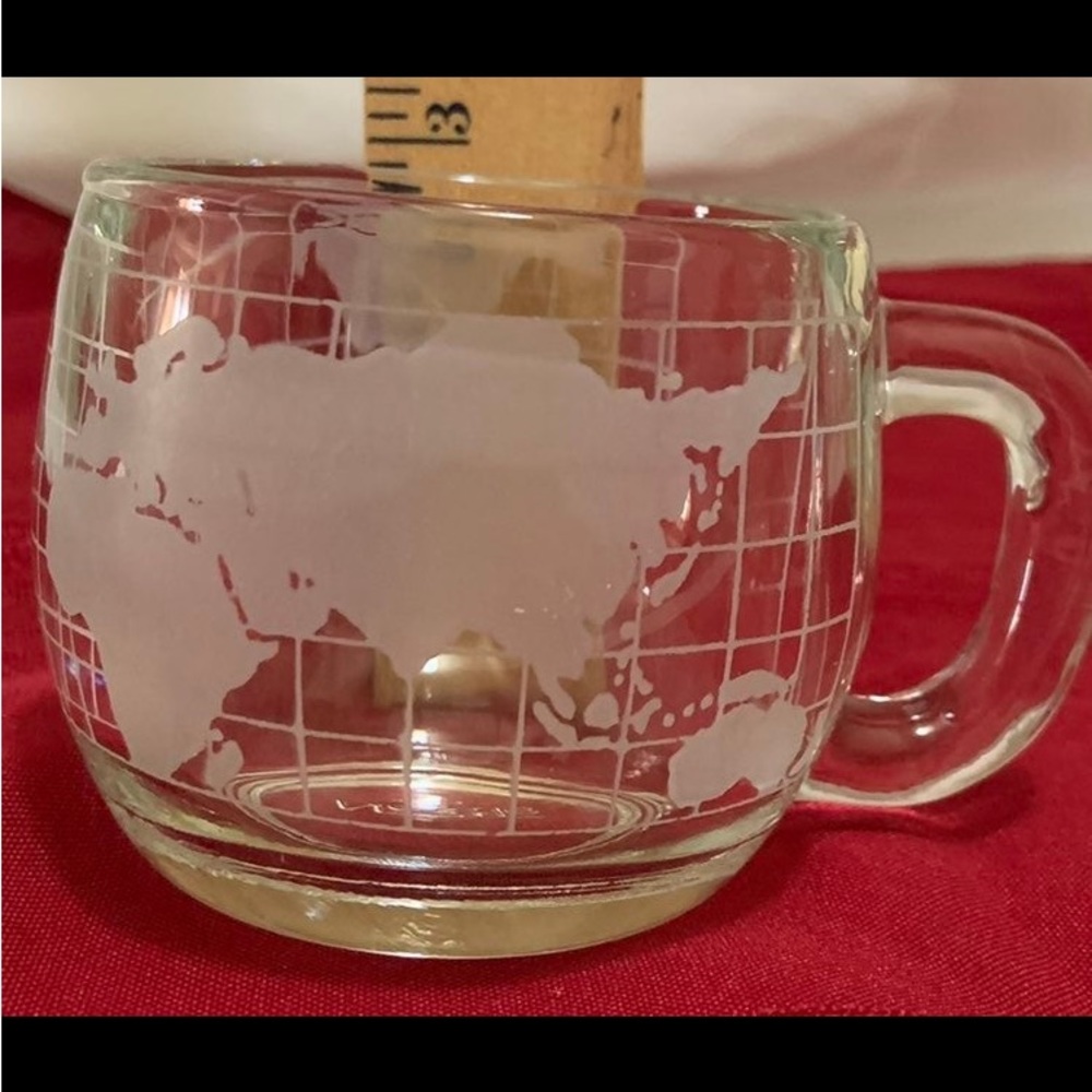 Set of four Nestle World coffee , tea , or cocoa mugs